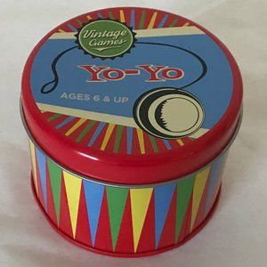 Yoyo in colorful round, lidded tin NWOT